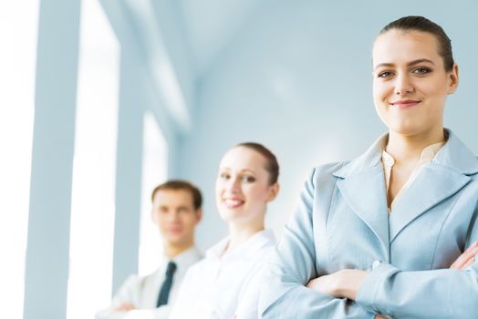 successful businessmen, a portrait of a business woman standing next to colleagues