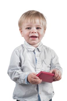 Little cute boy with phone on his hands