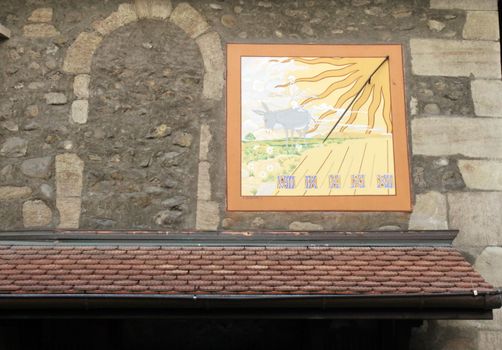 Ancient solar clock on a wall in the old city, Geneva, Switzerland