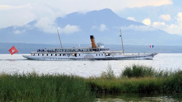 GENEVA, SWITZERLAND - AUGUST 8 : old steamboat "Montreux" floating on Geneva lake, Switzerland, Augut 8, 2013.
