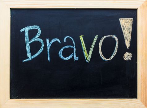 "Bravo" word on black board.