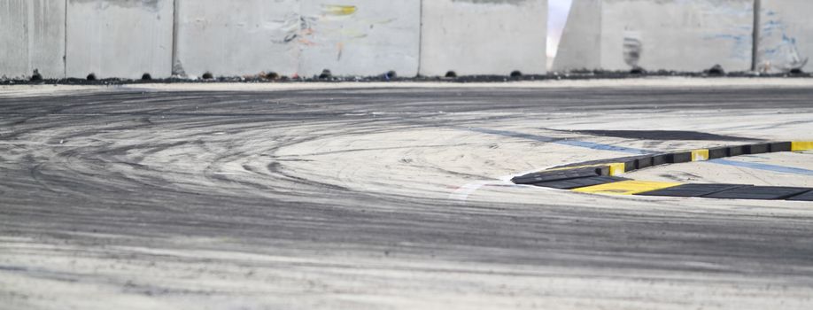 Background with tire marks on road track