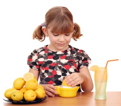 beautiful little girl make lemonade