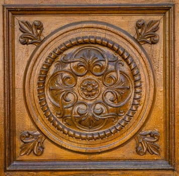 carved wooden pattern on old door