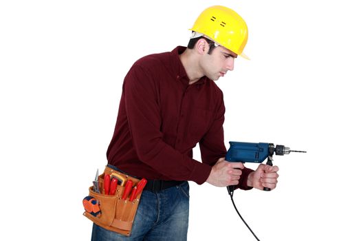 Carpenter with power drill