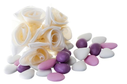 flowers candy and weddings favors on white background