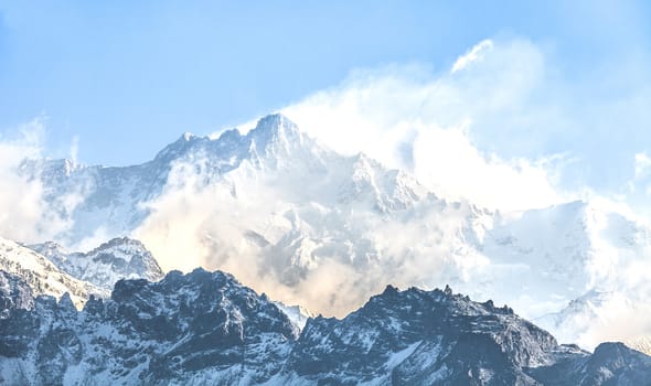 Kangchenjunga is the third highest mountain in the world. It rises with an elevation of 8,586 m : From Dzongri View Point