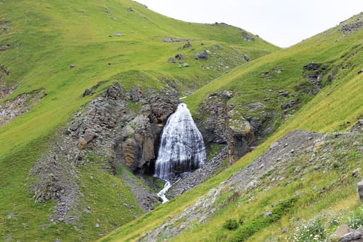 Waterfall Girlish Braids between the mountains of Northern Caucas