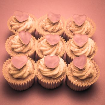 Valentines cupcakes on pink background