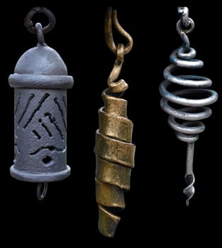 The 3 decorative metal pendant isolated on a black background