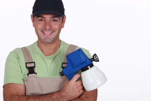 Man with a pressure sprayer