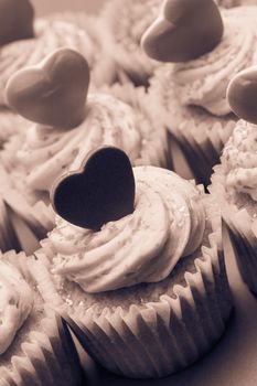 Close up of valentines cupcakes in sepia tint