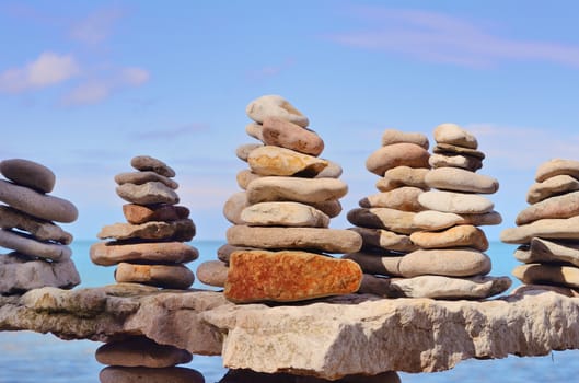 Balancing of pebbles each other on the seacoast