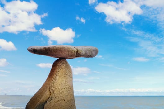 Balancing of two stones on the seacoast