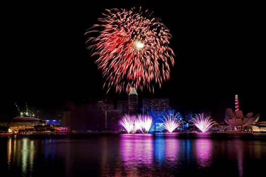 Fireworks over Marina bay in Singapore on National day rehersal