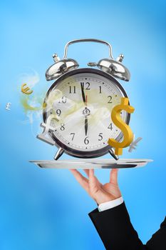 Waiter holding up time is money concept on blue background