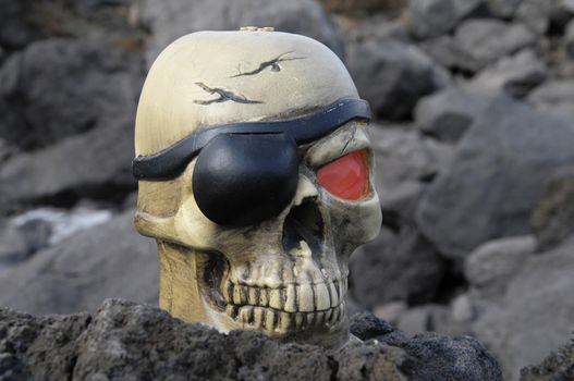 One Pirate Skull with a Red Eye and a Patch