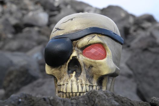 One Pirate Skull with a Red Eye and a Patch