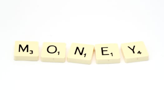 Money sign made of tiled letters on white background