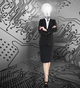 Businesswoman with folded arms and head light bulb against digital circuit board