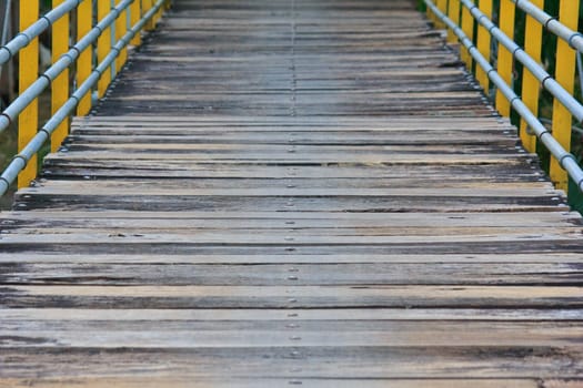 wooden bridge across river in south of Thailand