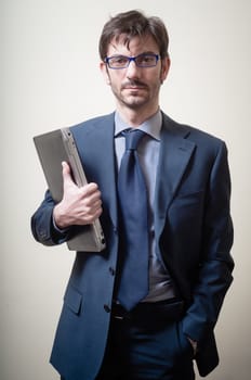 businessman with notebook on gray background