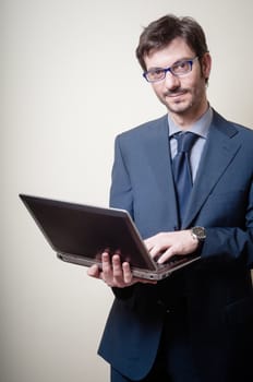 businessman with notebook on gray background