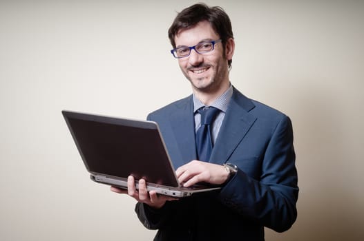 businessman with notebook on gray background