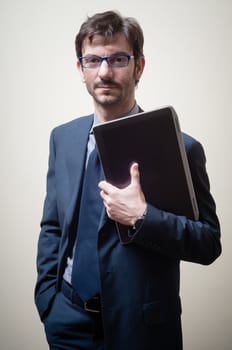 businessman with notebook on gray background
