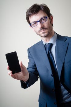 businessman on the phone on gray background