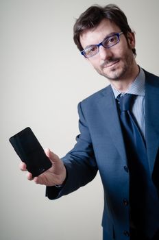 businessman on the phone on gray background