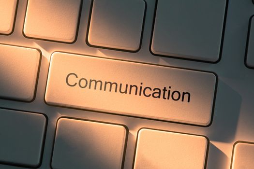 White keyboard with close up on communication button