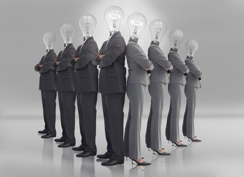 Business team with light bulb heads on grey background