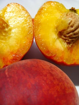 image of ripe peach cut with seed