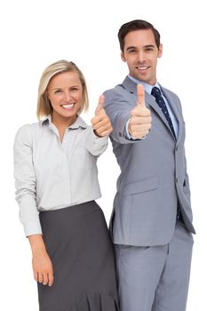 Business people showing thumbs up on white background