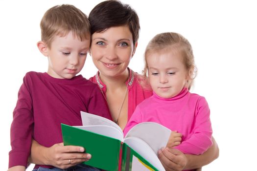 Son and daughter listening their mother reading book isolated on white