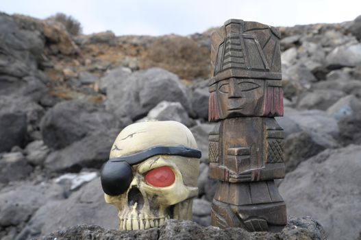 Ancient Maya Statue on the Rocks near the Ocean