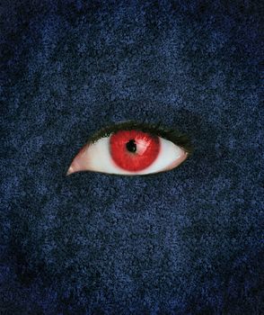Red eye with eyelashes over blue texture 