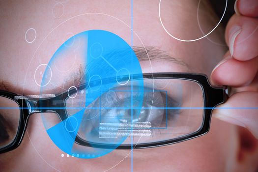 Blue eyed woman wearing glasses with blue identification technology