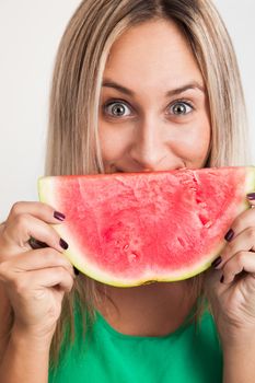 Cheerful Blond young Woman Holding Watermelon