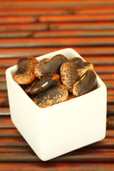 Giant black beans close up shallow dof 