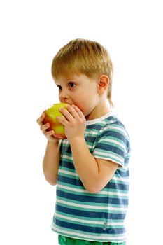 Little Boy in Striped T-Shirt Eating an Apple isolated on white background