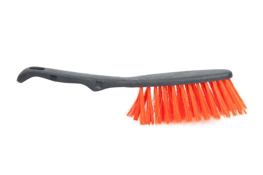 plastic orange brush isolated on white background