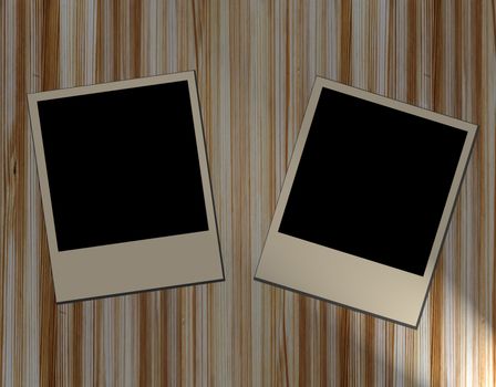 Blank old picture frames  on wooden background