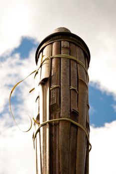 Top of an unlit tiki torch