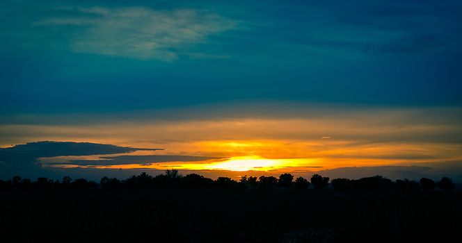 The Silhouette Landscape of Countryside Sunset View.