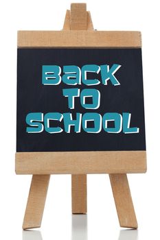 Back to school written in blue on chalkboard against white background