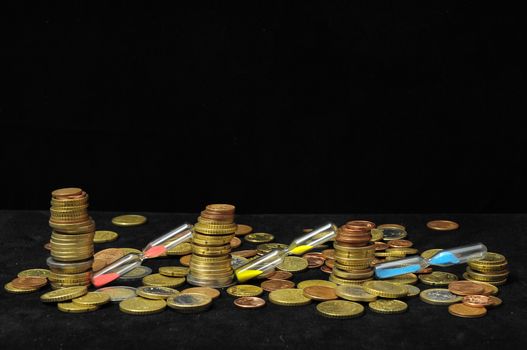 Business Time Concept Money and Hourglass on a Black Background