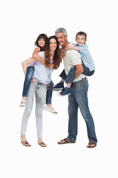 Parents holding their children on backs on white background