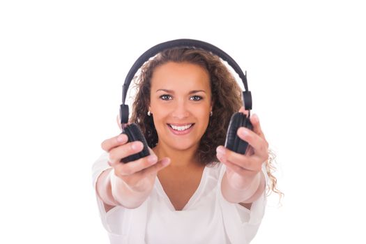 Woman listening to music with headphones isolated